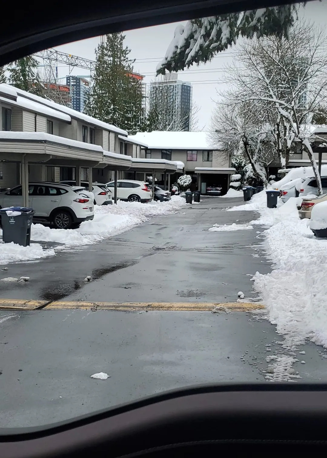 Snow-covered street during a storm callout
