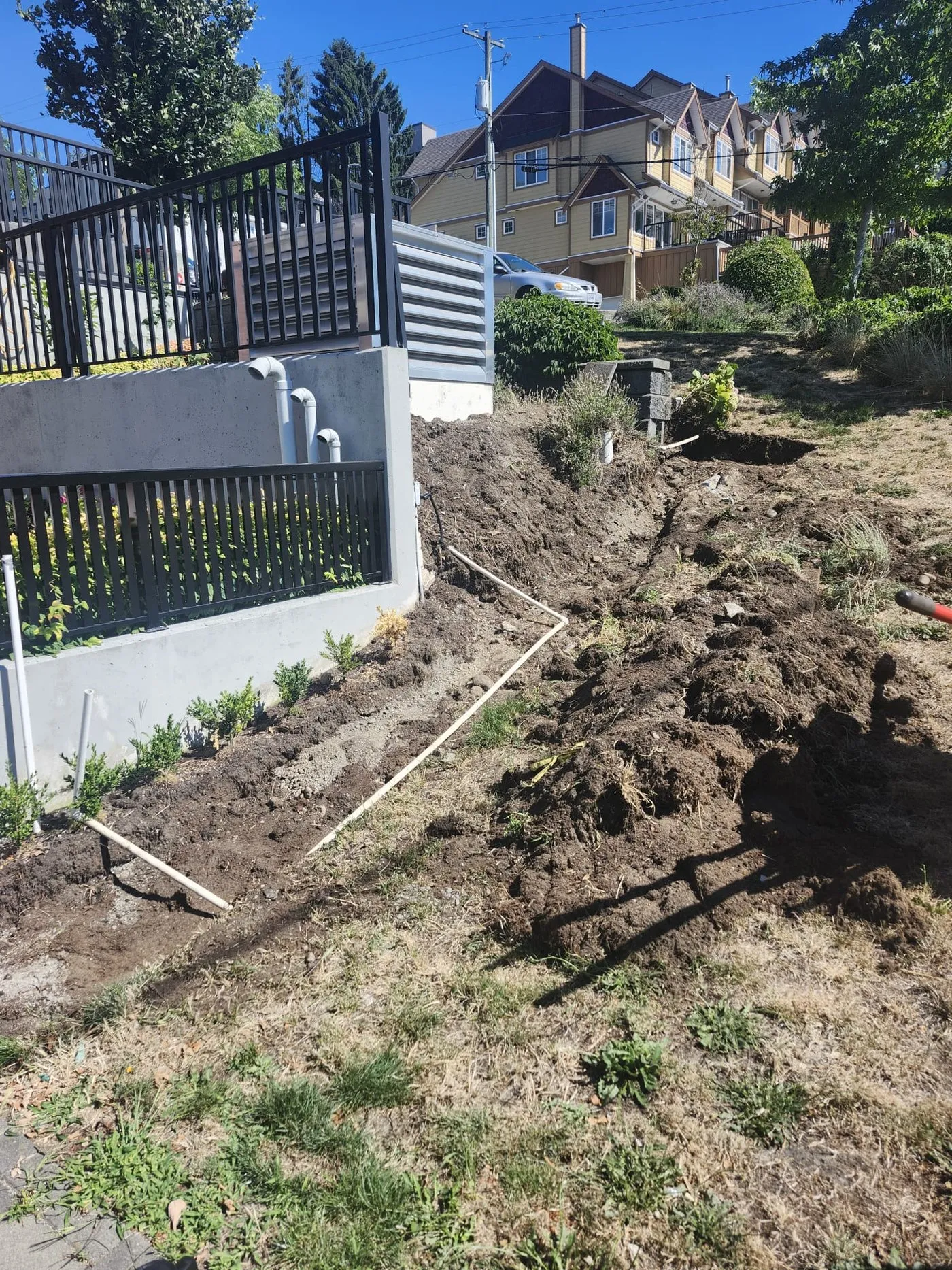 Before: small yard wall along the walk